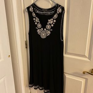Black knee length embroidered w/ white trim dress